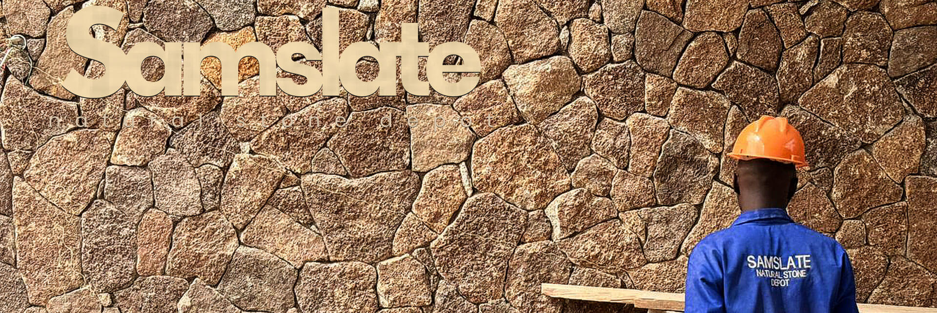 Samslate construction worker plastering stone wall - building and construction Zimbabwe